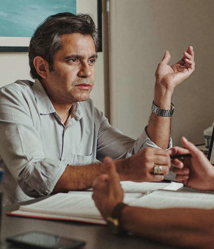 Insurance agent explaining a policy to a client